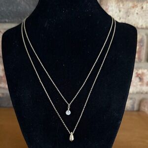Double strand dainty gold tone necklace with teardrop pendant and rivoli stone